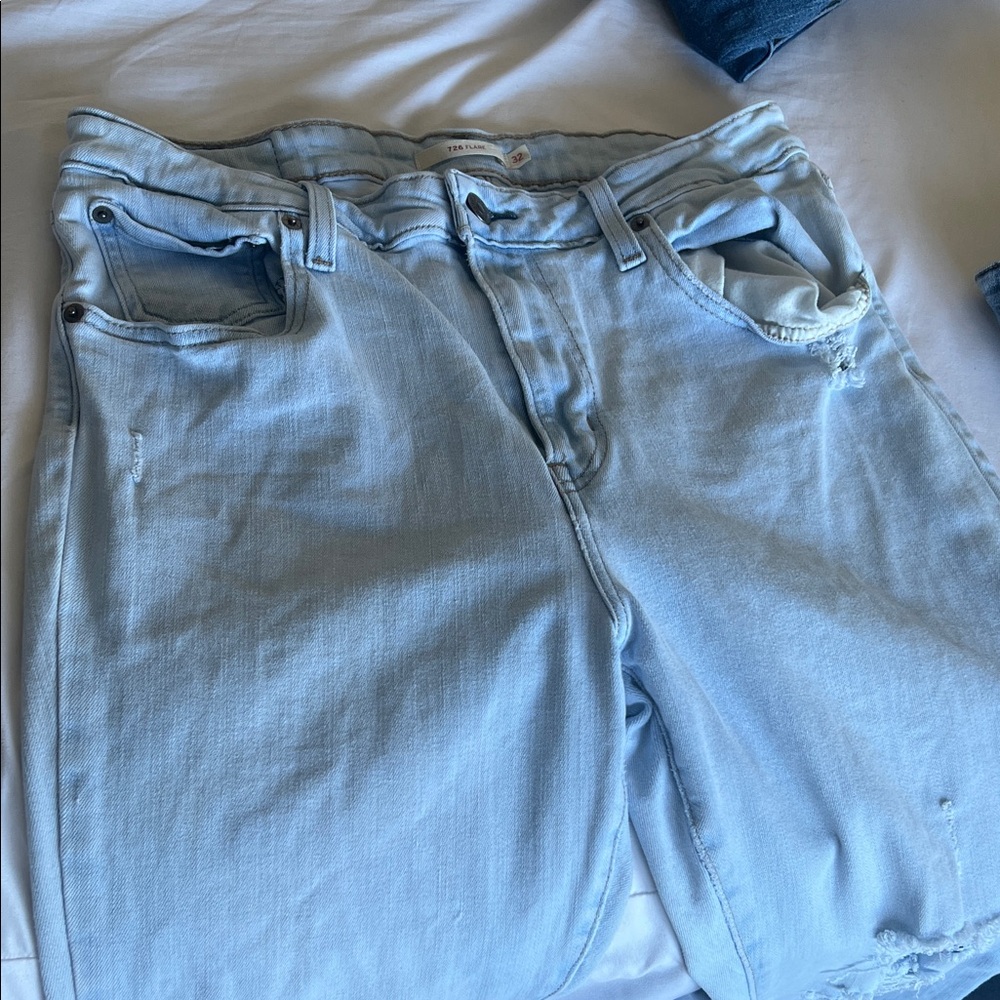 Light Blue Distressed Levi’s bootcut Jean